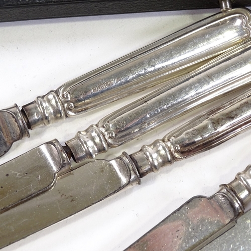 723 - 2 sets of 6 silver-handled fruit knives and a cased silver plated carving set (3)