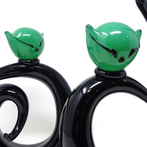 248 - A pair of Murano mid-century Studio glass cat sculptures, black glass bodies with green glass heads,... 