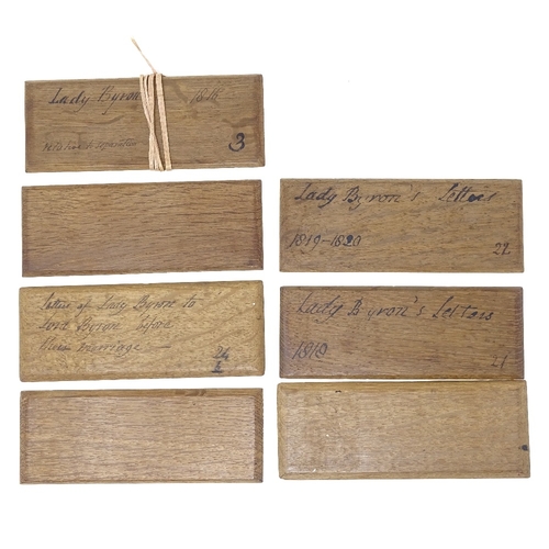 250 - A set of 7 oak letter binding blocks, with handwritten inscriptions relating to Lord and Lady Byron,... 