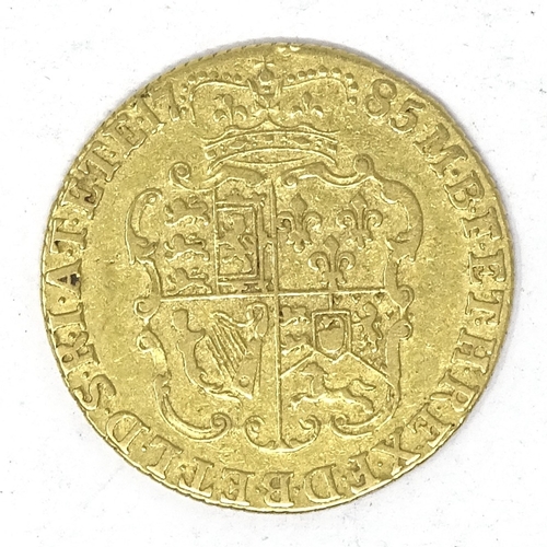 253 - A George III gold guinea, 1785 (fourth head)