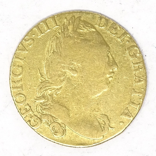 253 - A George III gold guinea, 1785 (fourth head)