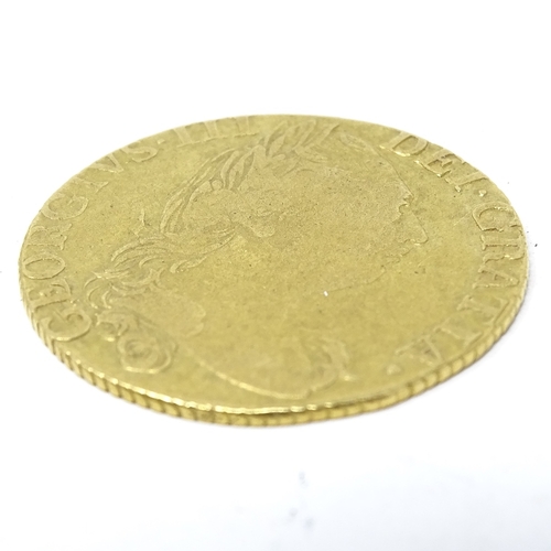 253 - A George III gold guinea, 1785 (fourth head)