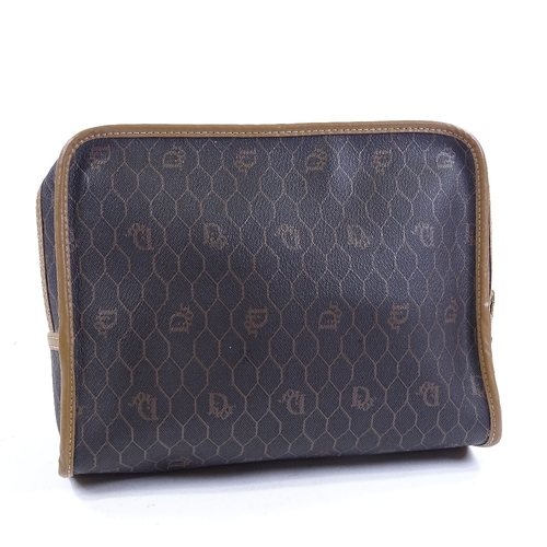 66 - CHRISTIAN DIOR - a Vintage Honeycomb Monogram makeup toiletry bag, circa 1970s, coated black PVC and... 