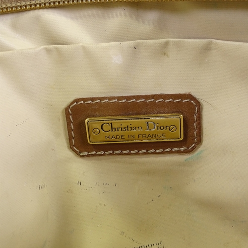 66 - CHRISTIAN DIOR - a Vintage Honeycomb Monogram makeup toiletry bag, circa 1970s, coated black PVC and... 