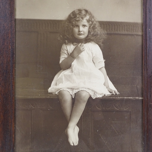 68 - A large format late 19th century photographic portrait of a child, in original frame and glazed, ove... 