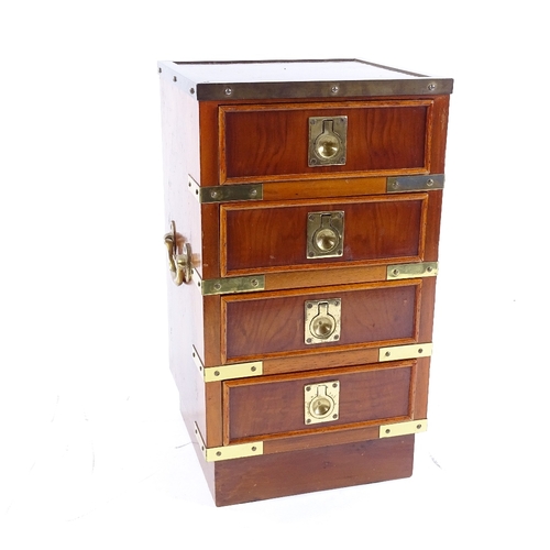 71 - A modern brass-bound yew wood table-top chest of 4 drawers, with brass carrying handles, height 37cm... 