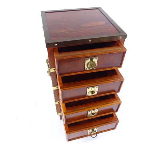 71 - A modern brass-bound yew wood table-top chest of 4 drawers, with brass carrying handles, height 37cm... 