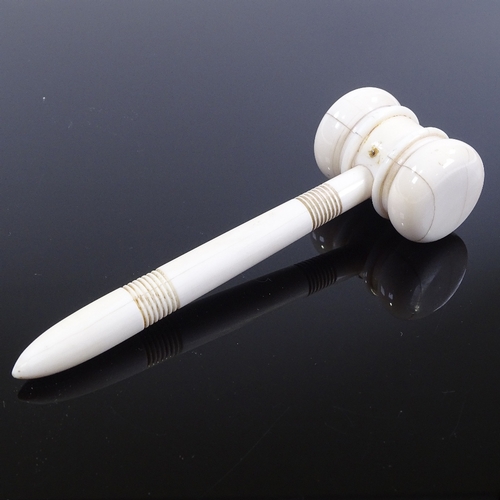 75 - An ivory gavel, circa 1900, length 14cm