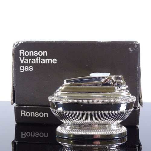 79 - A Ronson Varaflame gas chrome table lighter, length 9cm, original box