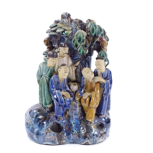 87 - A Chinese polychrome glazed pottery vase with applied figures, early 20th century, height 22cm