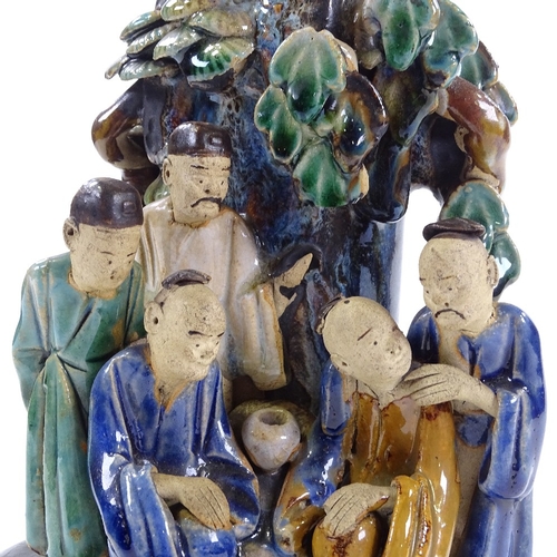 87 - A Chinese polychrome glazed pottery vase with applied figures, early 20th century, height 22cm