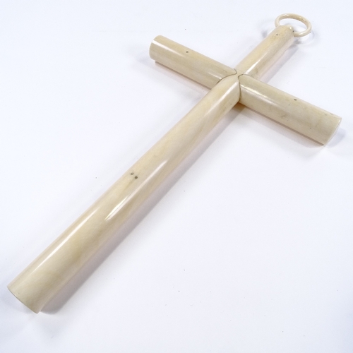 95 - A large late 19th century French hollow ivory cross, dated 1891, length excluding loop 45cm