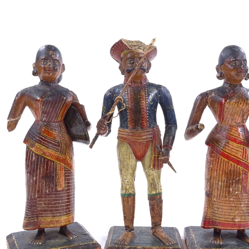 98 - A set of 6 Indian carved and painted wood and gesso standing figures, largest height 24cm