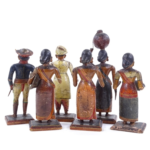 98 - A set of 6 Indian carved and painted wood and gesso standing figures, largest height 24cm