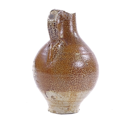 113 - A salt glaze Bellarmine stoneware flagon, 16th/17th century, height 20cm, A/F