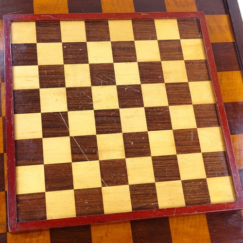 129 - A large 19th century rosewood and satinwood inlaid chess board, 61cm across, and a smaller chess gam... 