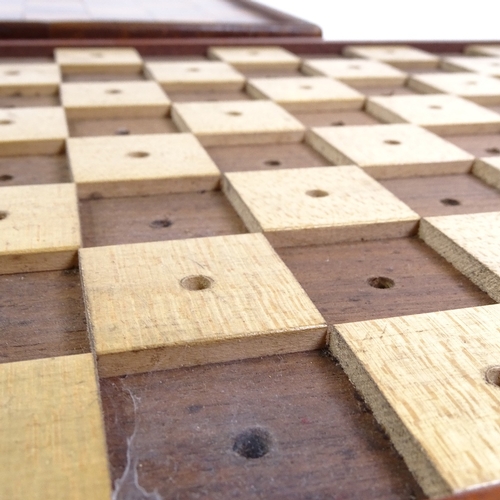 130 - An early 19th century rosewood and satinwood travelling chess board, length 23cm, a chess board for ... 