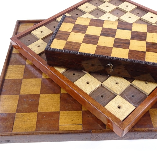 130 - An early 19th century rosewood and satinwood travelling chess board, length 23cm, a chess board for ... 