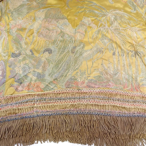 132 - A Middle Eastern embroidered bed cover with tasseled fringe, main panel approx 215cm x 185cm (exclud... 