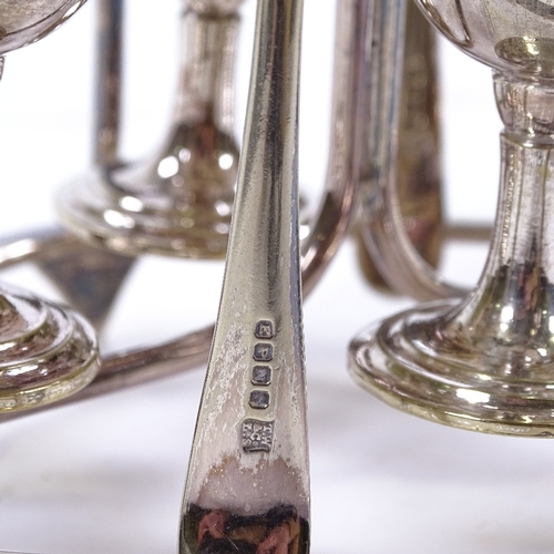 189 - An electroplate egg cruet on stand, with matching spoons