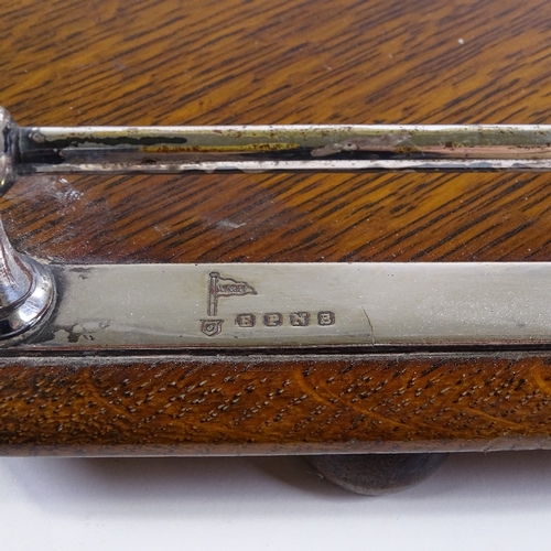 190 - An Edwardian oak tea tray with electroplate mounts, length 58cm