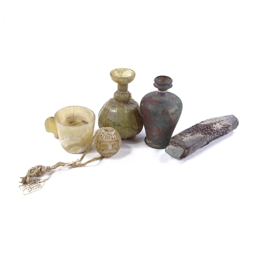 201 - A group of Antiquities, comprising a patinated Roman bronze vase, height 9cm, an iridescent glass fl... 