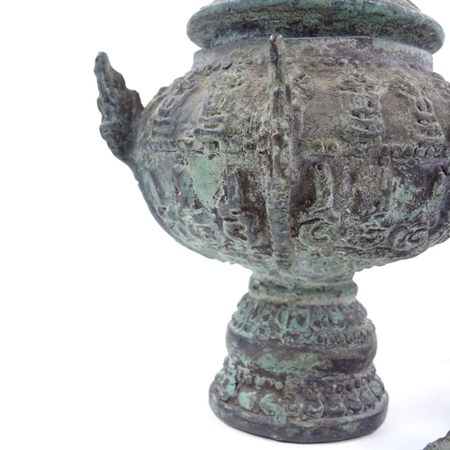 203 - A group of Oriental Antiquities, comprising a verdigris bronze pot and cover, height 15cm, an Egypti... 