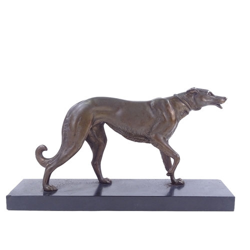 214 - A bronze patinated spelter greyhound on slate base, signed Rochard, base length 46cm