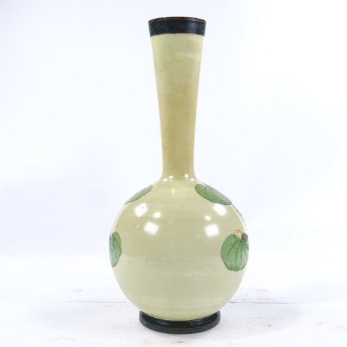 217 - A French milk glass narrow-necked vase with transfer decorated panel, signed Boucher, height 37cm