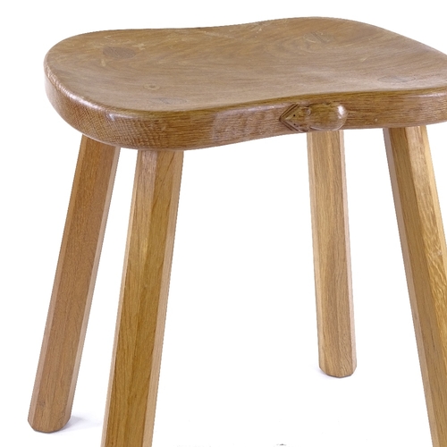 219 - Robert Mouseman Thompson, golden oak stool on tapered octagonal legs, seat dimensions 36cm x 30cm, h... 