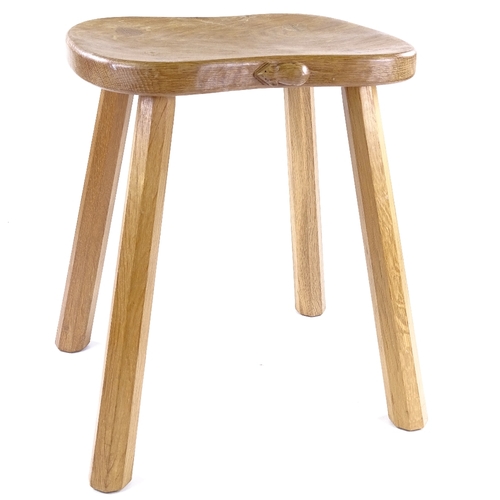 219 - Robert Mouseman Thompson, golden oak stool on tapered octagonal legs, seat dimensions 36cm x 30cm, h... 