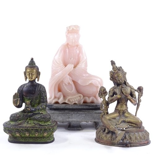 227 - 2 Oriental bronze deities, and a carved pink soapstone Buddha on stone plinth (3)