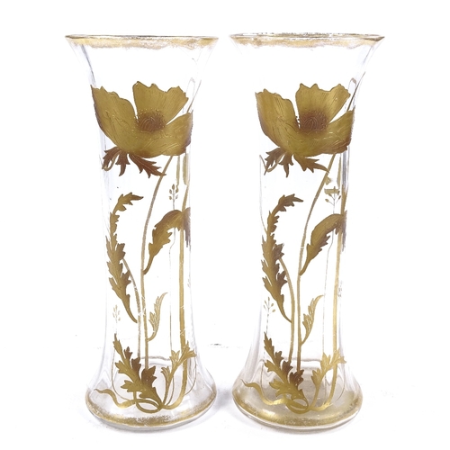 228 - A pair of Art Nouveau hand blown glass vases, with hand painted gilded poppy designs, circa 1900, he... 