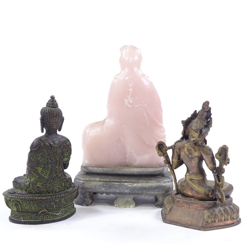 227 - 2 Oriental bronze deities, and a carved pink soapstone Buddha on stone plinth (3)