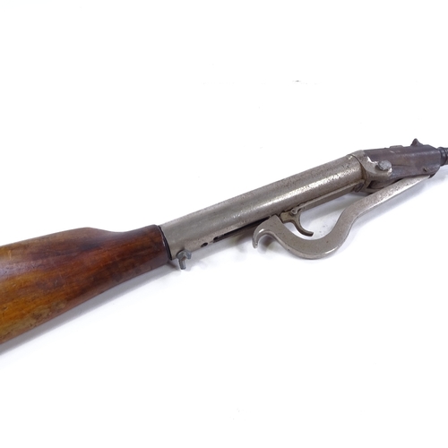 243 - An Antique Diana air rifle