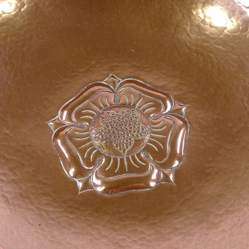 247 - A Keswick planished copper Tudor Rose pattern fruit bowl, stamped R12 KSIA Keswick, 28cm across