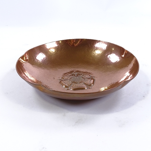 247 - A Keswick planished copper Tudor Rose pattern fruit bowl, stamped R12 KSIA Keswick, 28cm across