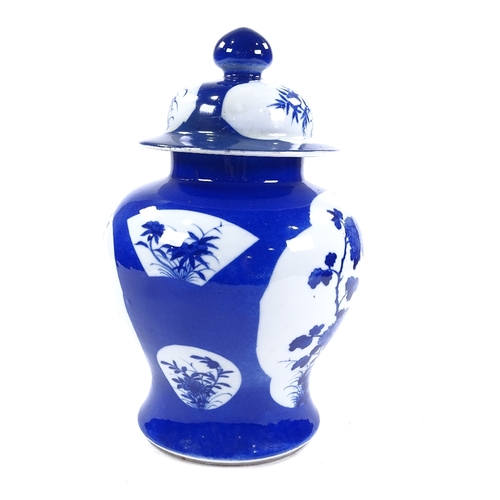 254 - A Chinese blue and white porcelain jar and cover, hand painted bird decorated panels, height 31cm