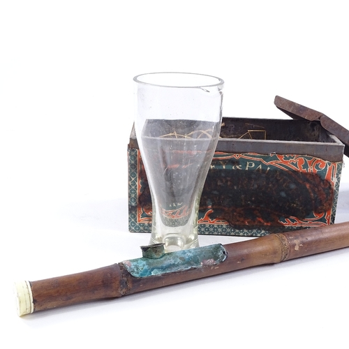 268 - A Chinese bamboo and ivory-tipped opium pipe with glass chimney, length 56cm