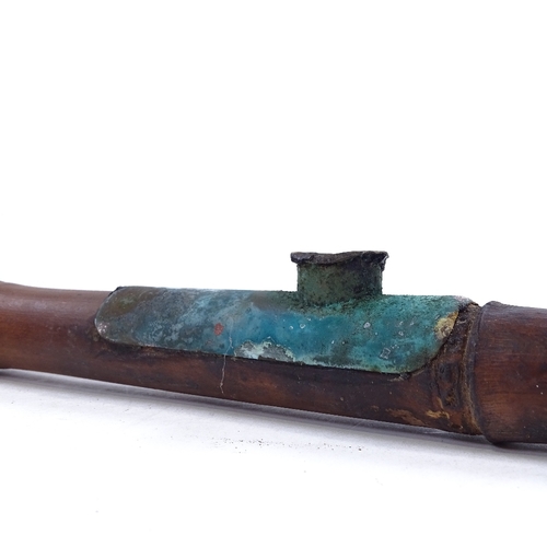 268 - A Chinese bamboo and ivory-tipped opium pipe with glass chimney, length 56cm