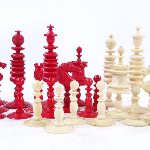 273 - A 19th century natural white and red stained ivory chess set, King height 9cm, complete and in good ... 