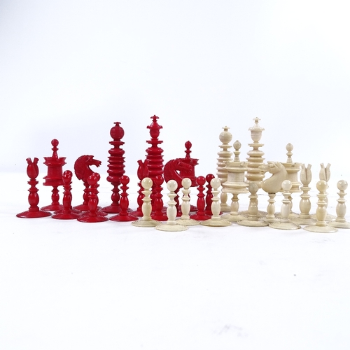 273 - A 19th century natural white and red stained ivory chess set, King height 9cm, complete and in good ... 