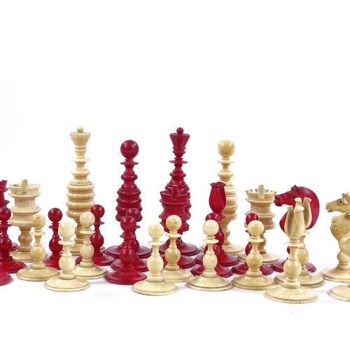 274 - A 19th century natural and red stained ivory chess set, King height 8cm, complete and in good condit... 