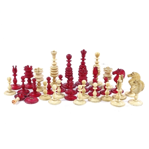 274 - A 19th century natural and red stained ivory chess set, King height 8cm, complete and in good condit... 