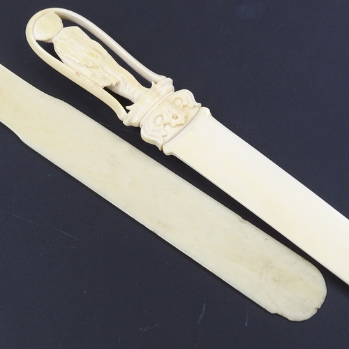 283 - A Chinese ivory paper knife with relief carved handle in the form of a deity, length 30cm, and a pla... 