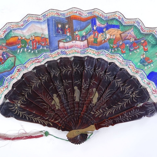 289 - A Chinese gilded and lacquered fan, circa 1900, with hand painted paper screen