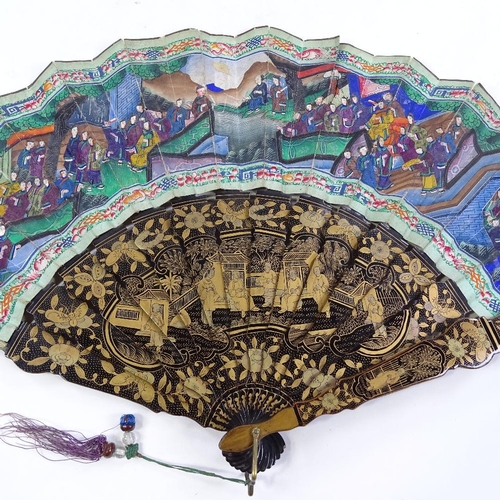 290 - A Chinese gilded and lacquered fan, circa 1900, with hand painted paper screen