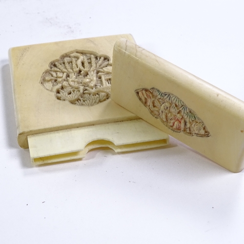 292 - A 19th century Chinese ivory card case with relief carved covers, length 10.5cm