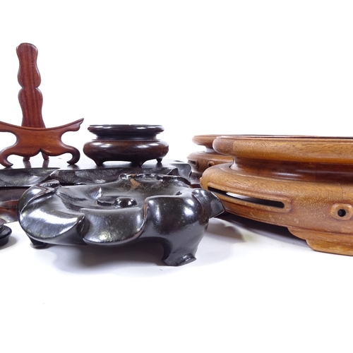 127 - A collection of Chinese hardwood stands (10)