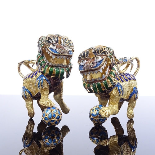 211 - A pair of Chinese silver-gilt and enamel Dogs of Fo, length 8cm